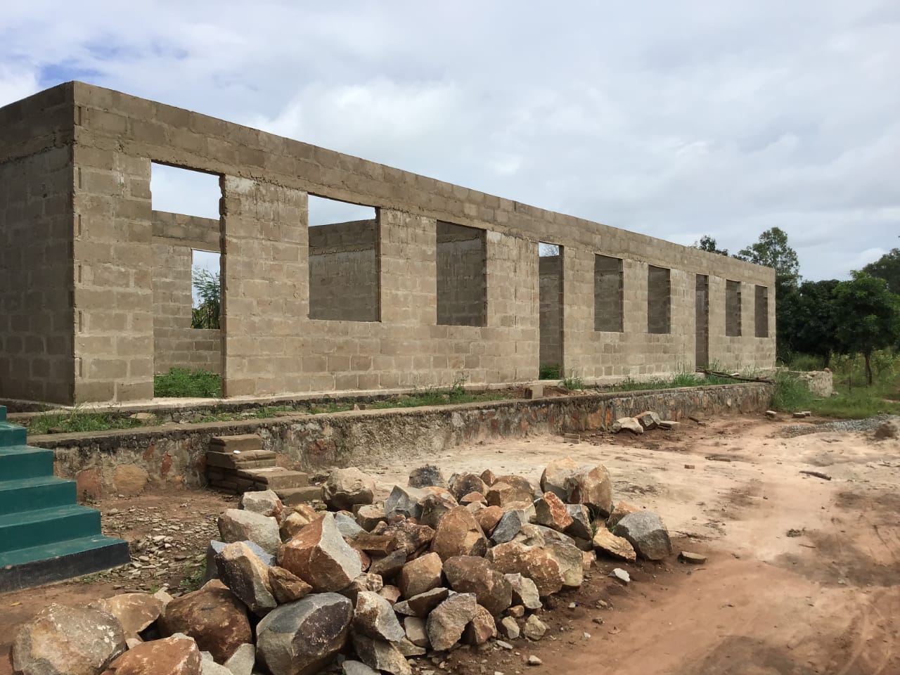 Work on the new classroom block has reached eaves height